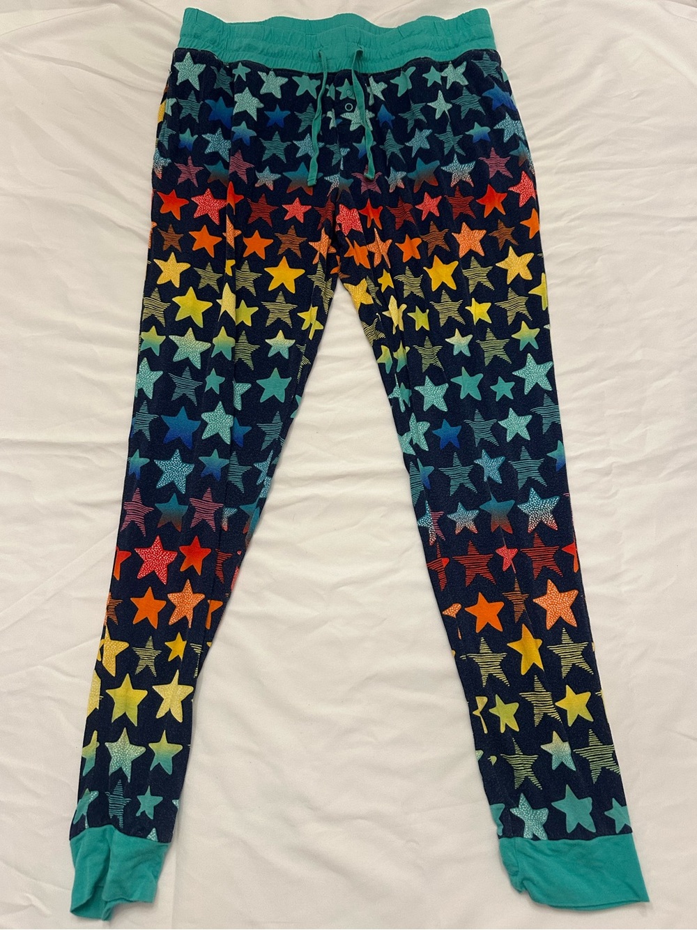 Little Sleepies Navy pajama pants with Multicolor Stars and Teal Trim